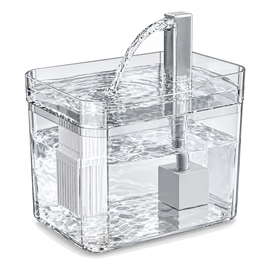 Transparent cat water fountain on a white background, with a clear tank and drinking tray, a silver spout, and the filter basket and pump visible inside