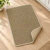 Corner of the mat folded back to show the anti-slip underside