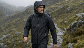 Montane Men's Norste Lite jacket, worn outdoors in wet weather.