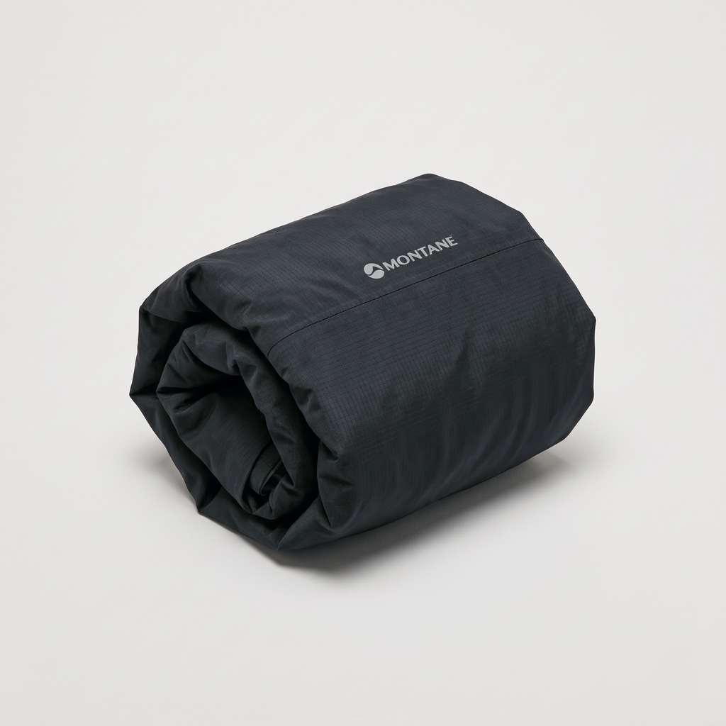 The jacket rolled loosely on a neutral surface, no bag or measure beside it.