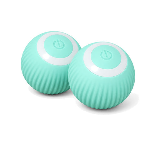 Two mint-green self-rolling cat balls on a white background, each with a ribbed shell, a white ring and a power button on top.