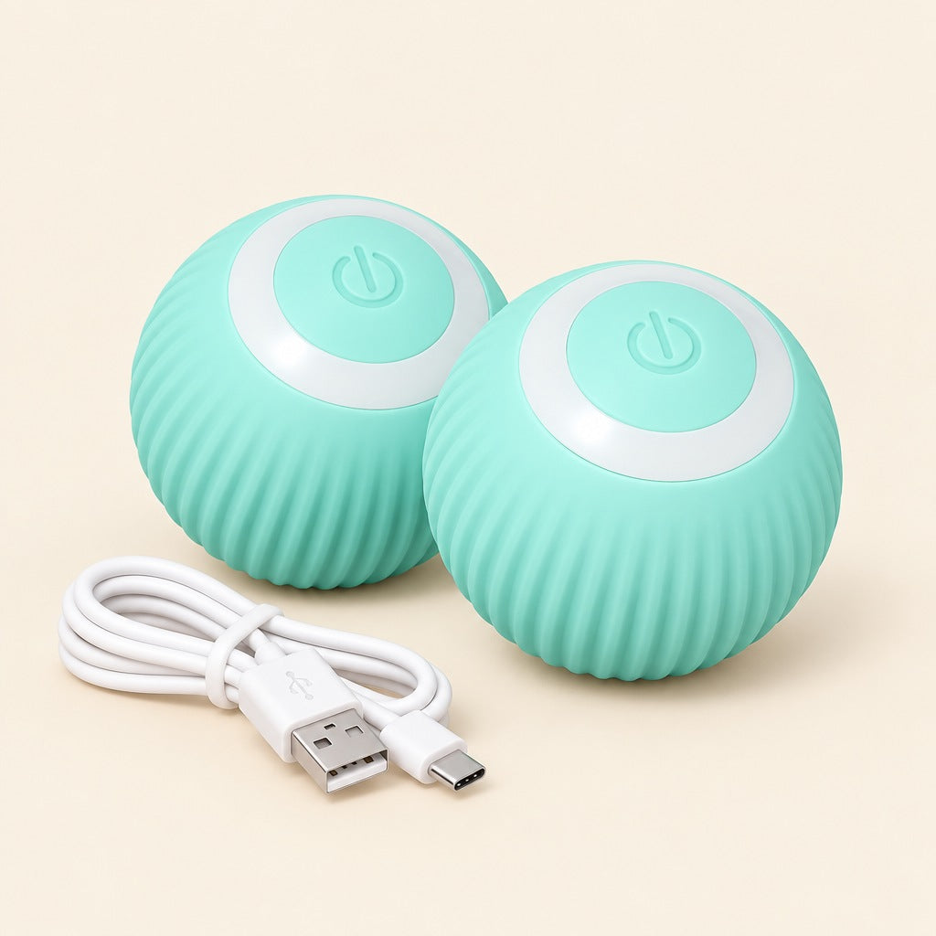 Two blue self-rolling cat balls side by side with a USB charging cable