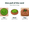 The same green and brown snuffle bowl shown three ways: open flat as a mat, drawn up into a bowl, and pulled shut into a small round bag