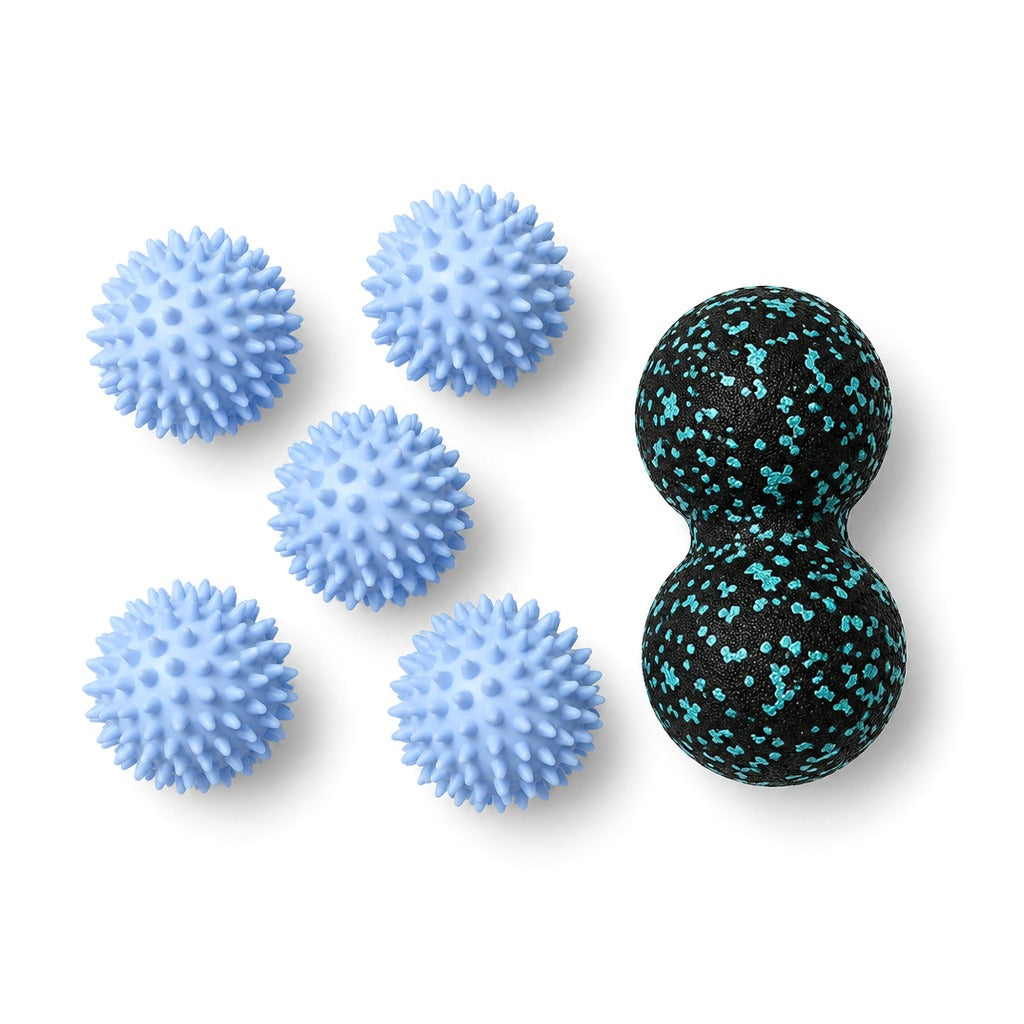Five blue spiky massage balls and a blue peanut massage ball on white