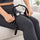Two-ball massage tool used on a thigh